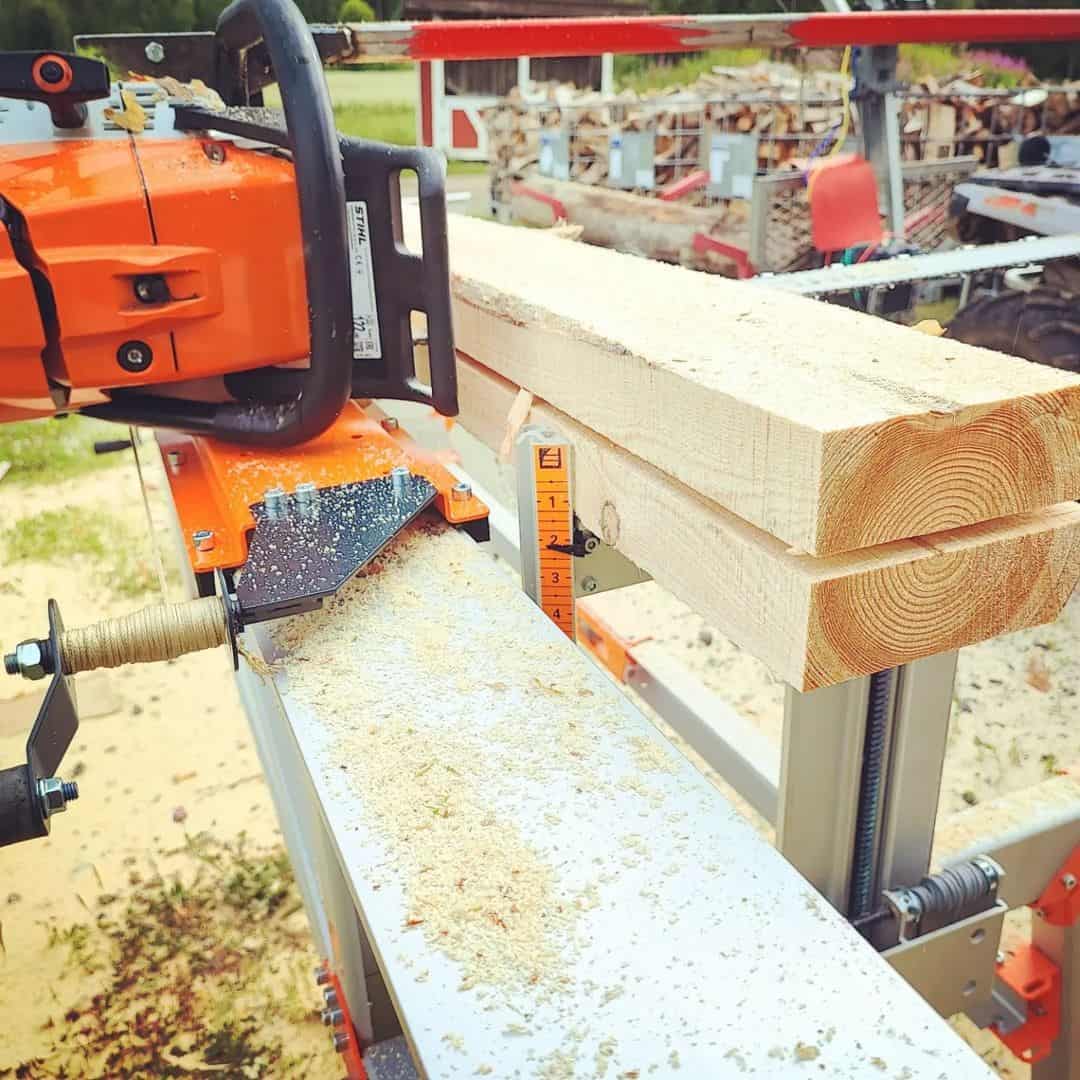 Orange chainsaw milling wooden bar 