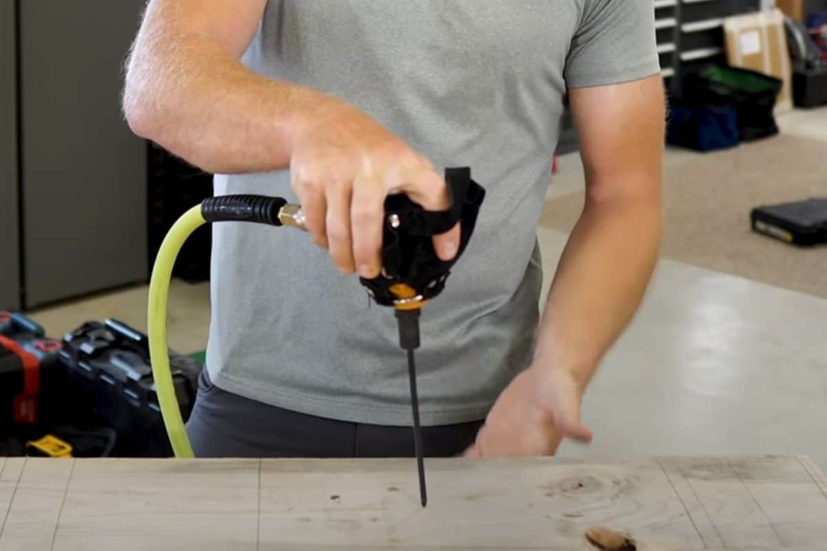 Putting hand on a palm nailer