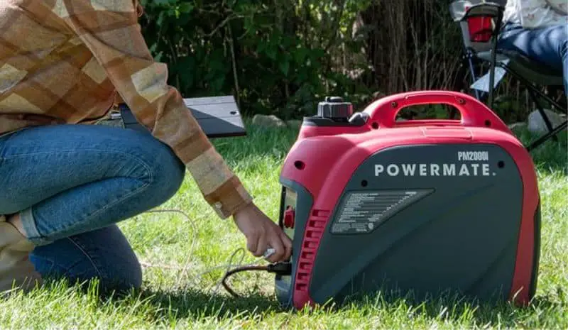 Woman turning on generator